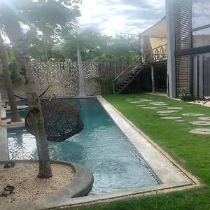 ariche-tulum-hotel-hostal.quintano-roohotels.com/